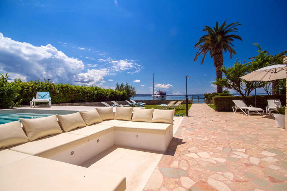Comfortable lounge sitting area attached to the pool