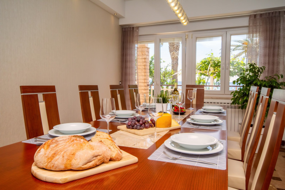 Comfortable dining and living area with direct exit to the outdoor dining area