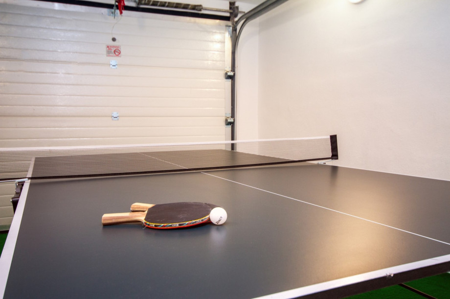 Table tennis in a garage at the parking area