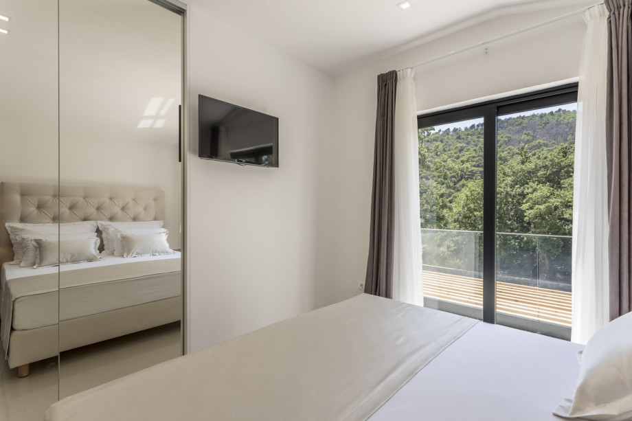 Bedroom No2 with king-size bed 180cm x 200cm, air-condition, a TV  and balcony