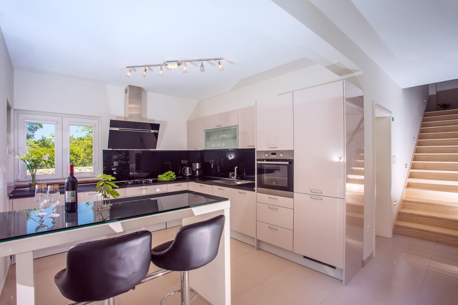 Light and modern, fully equipped kitchen with all needed amenities