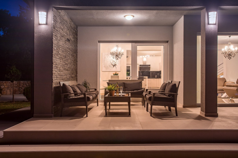 Outdoor lounge seating in front of the living room