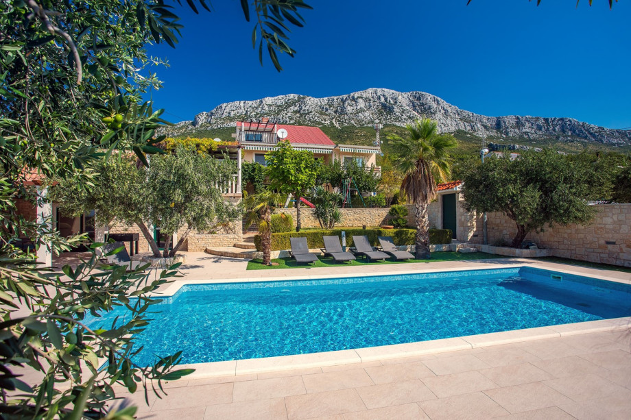 Pool view on the surrounded nature and mountains