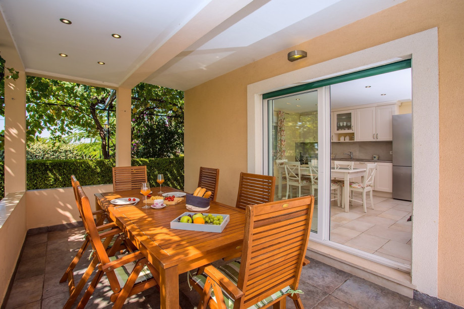 Covered outdoor with dining area for 14 people