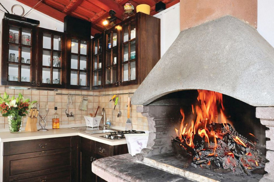 Summer kitchen with a traditional barbecue (on the west side of Villa)