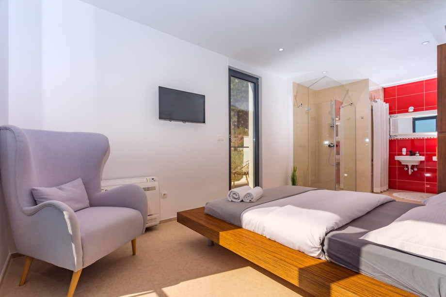 Bedroom No3 also  offers AC, TV, en-suite bathroom with shower  (highest level)