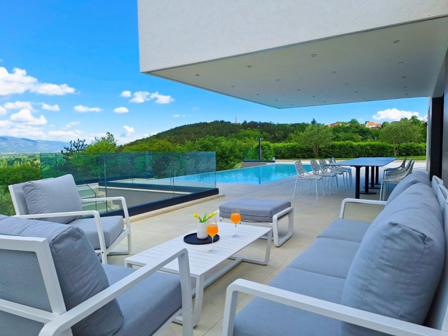 Comfortable lounge sofa, perfect for relaxing on a nice summer day