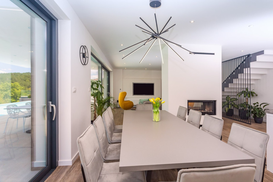 The entire front of the house is glazed and fitted with shutters that provide total black out.