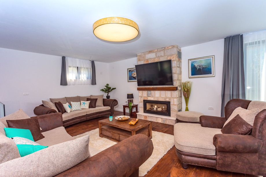 There is also a fireplace, a TV, PS4