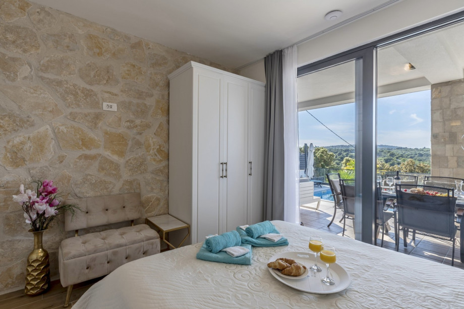 Bedroom No1 and No3 have pool view and direct approach to the pool area