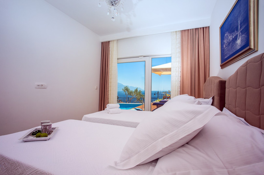 Bedroom No2 has an exit to the pool area