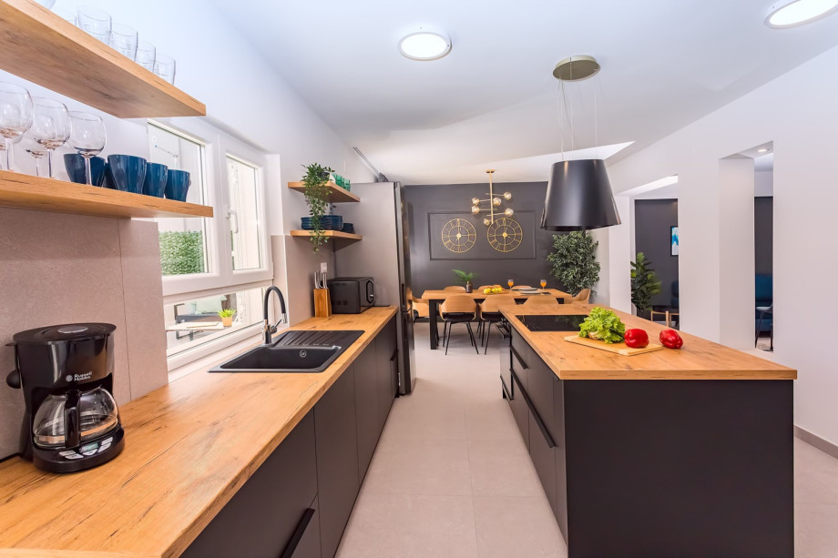 The ground floor offers a very spacious and comfortable opened plan living and dining room