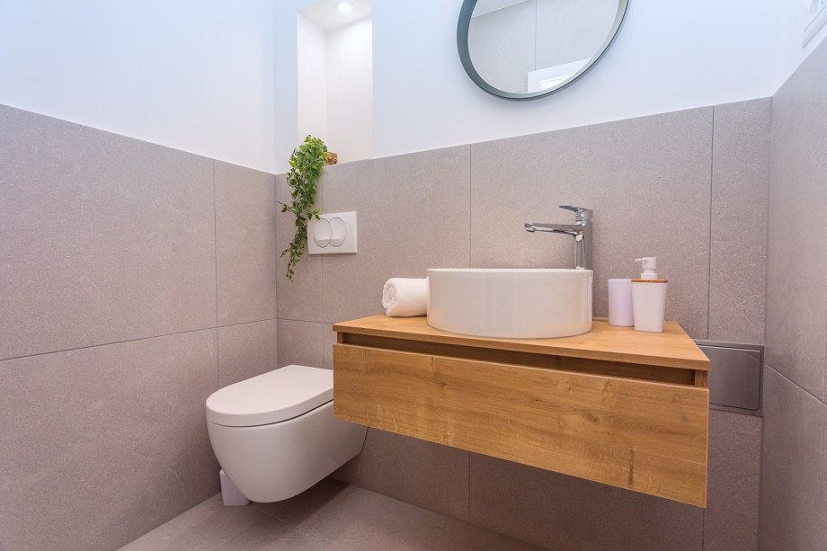 A separate toilet on the ground floor, next to the Media room