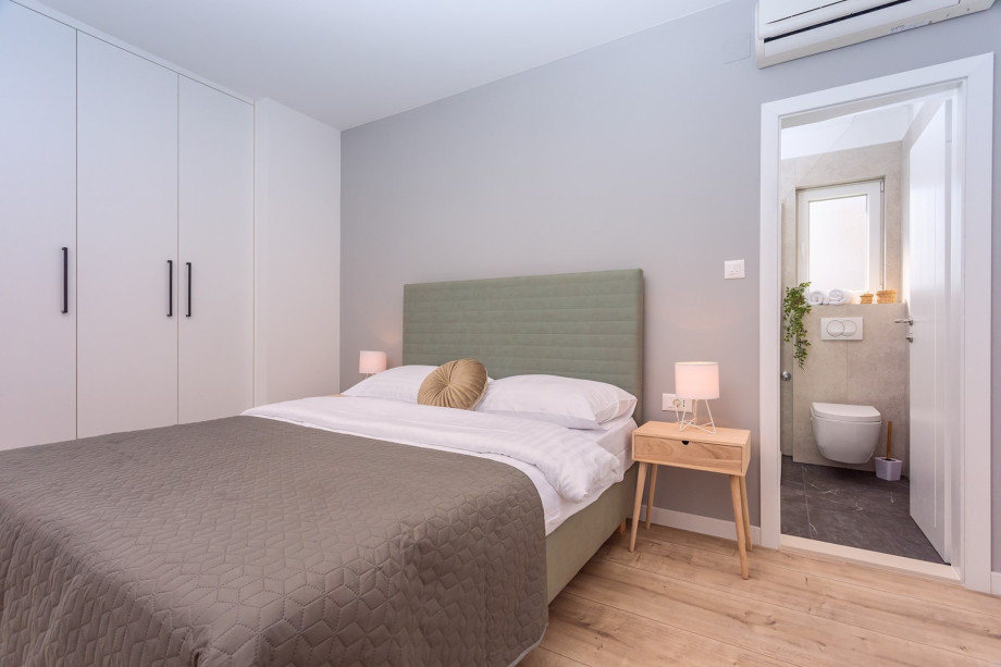 Bedroom No2 has exit to the balcony with mountain views.