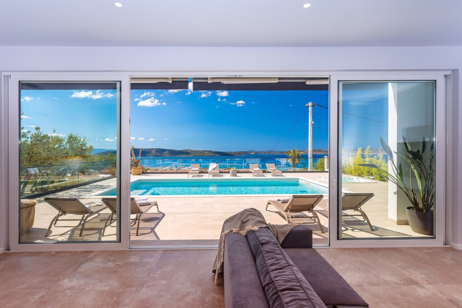 Glass walls provide amazing sea views from every corner of the property.