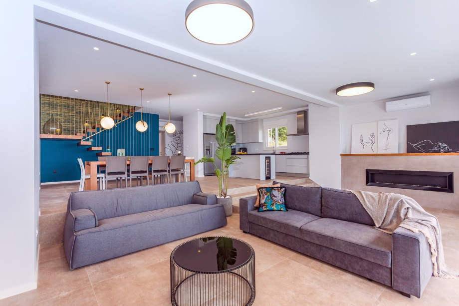 The spacious living and dining area is on the ground floor.