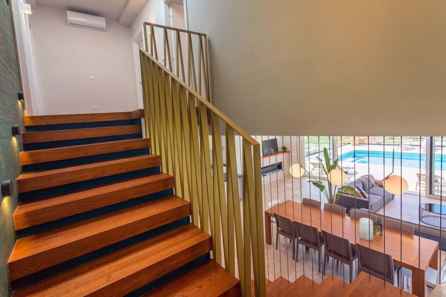 Nicely decorated indoor steps toward bedrooms