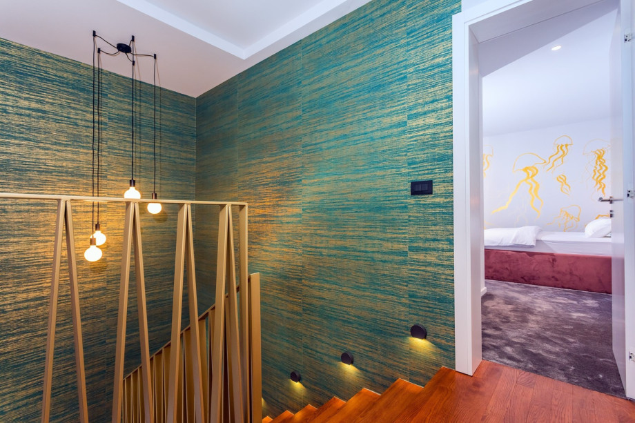 Nicely decorated indoor steps toward bedrooms