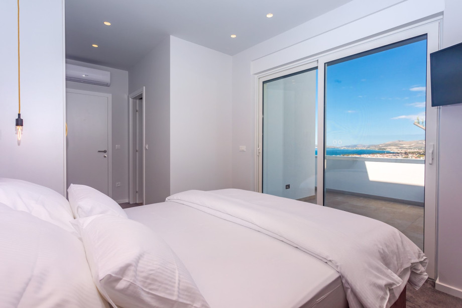 Bedroom No2 has an exit to the terrace on the west side with sea views.