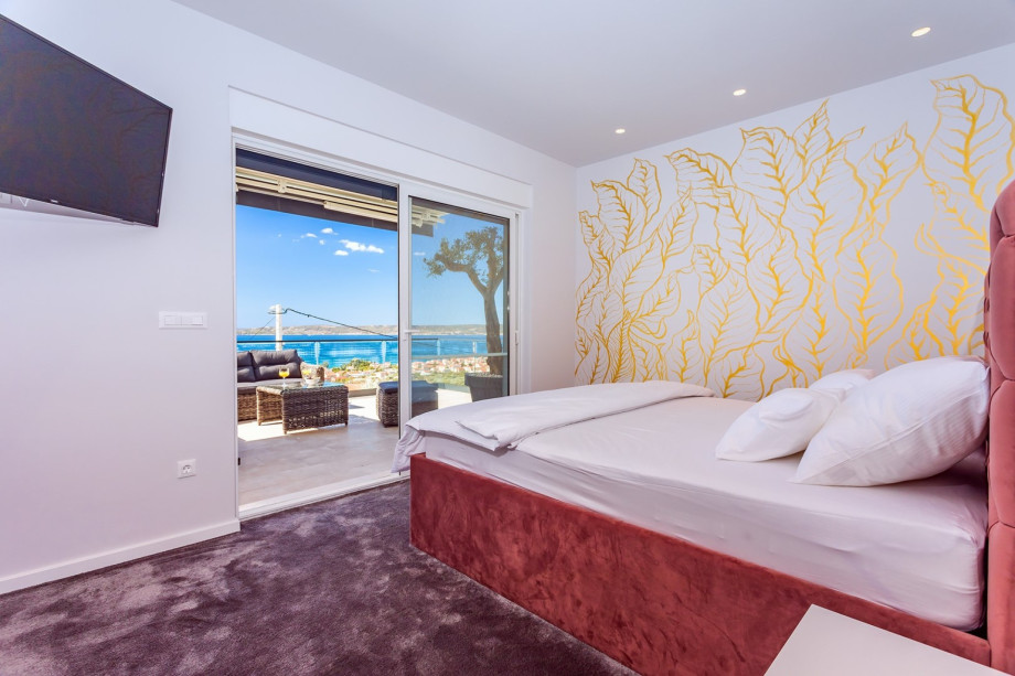 Bedroom No3 with queen-size bed 160cm x 200cm, a TV,  A/C, en-suite bathroom with a shower