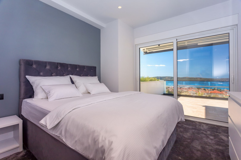 Bedroom No4 with queen-size bed 160cm x 200cm, a TV,  A/C, en-suite bathroom with a shower