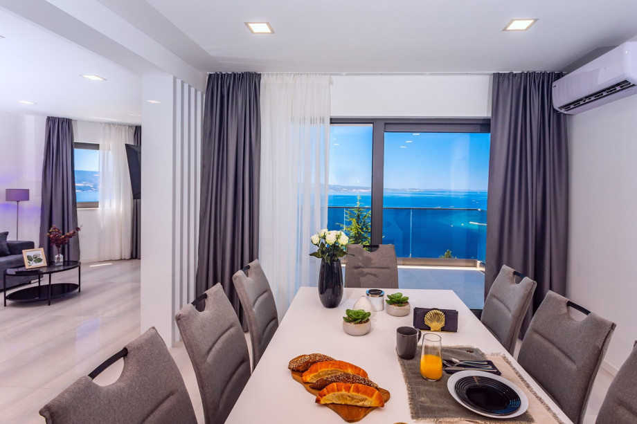 Glass walls provide amazing sea views.