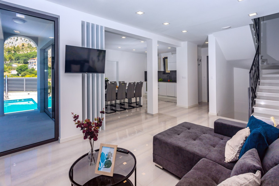 The living room also has an exit to the terrace with sea views