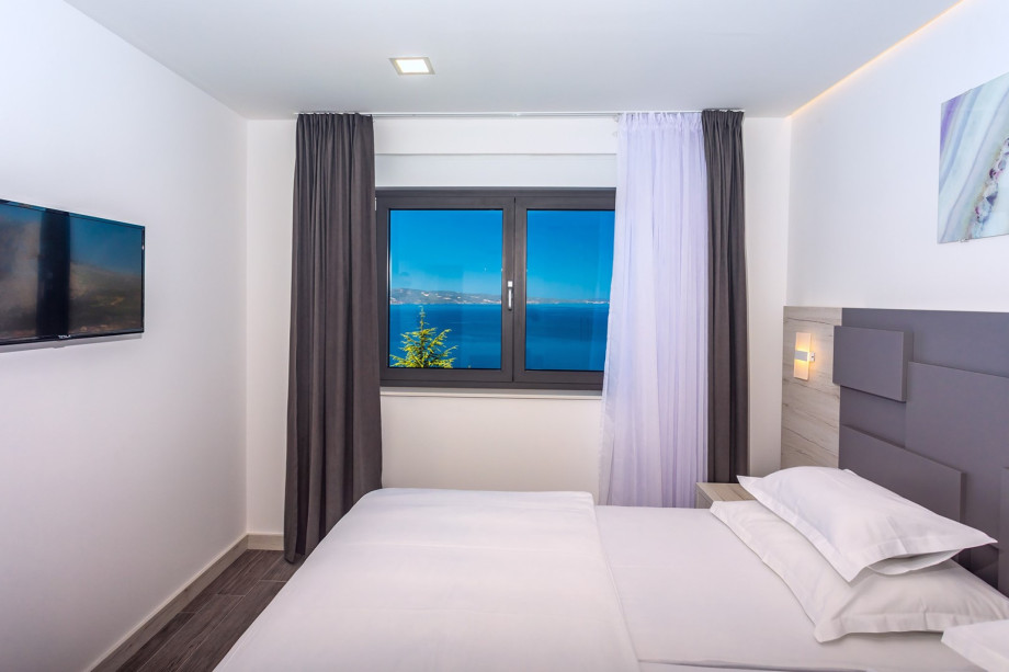 Bedroom No1 with king-size bed, TV, A/C, en-suite