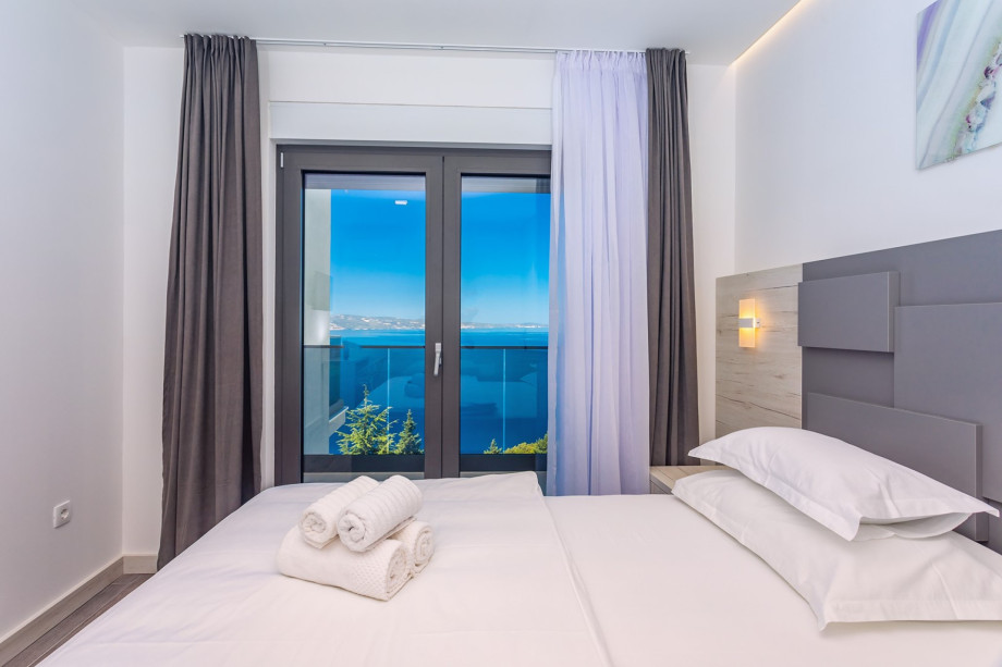 Bedroom No2 is on the first floor and offers an exit to the balcony