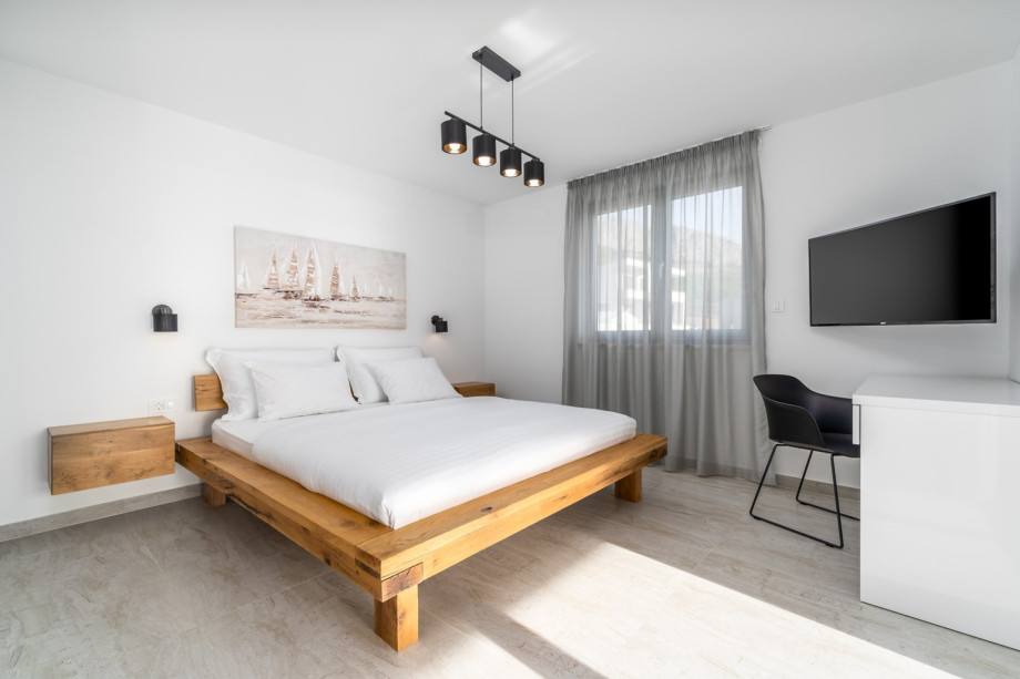 Bedroom No2 with king-size bed 180cm x 200cm, en-suite bathroom with shower, TV, A/C