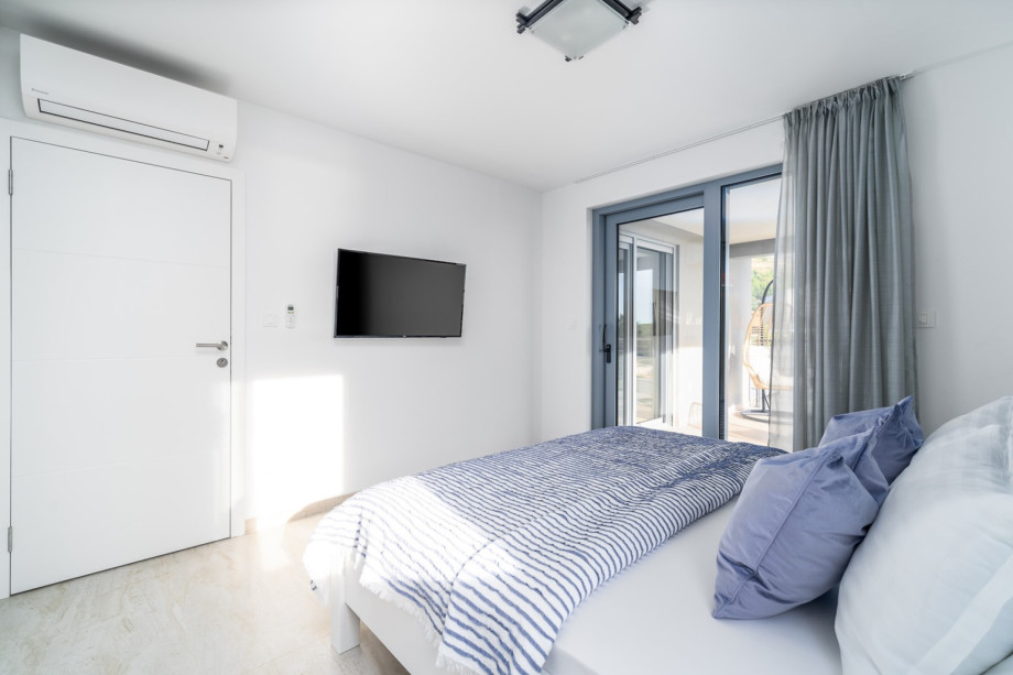 Bedroom No3 with king-size bed 180cm x 200cm, a TV, A/C