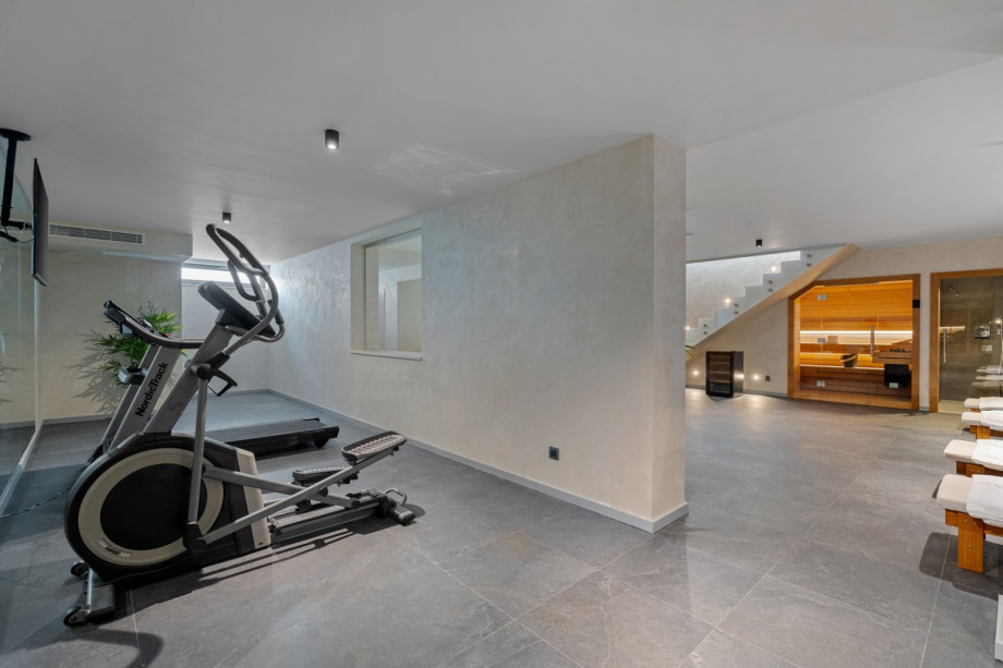 A Gym area offers an Orbitrack, a Treadmill, a TV and air-conditioning