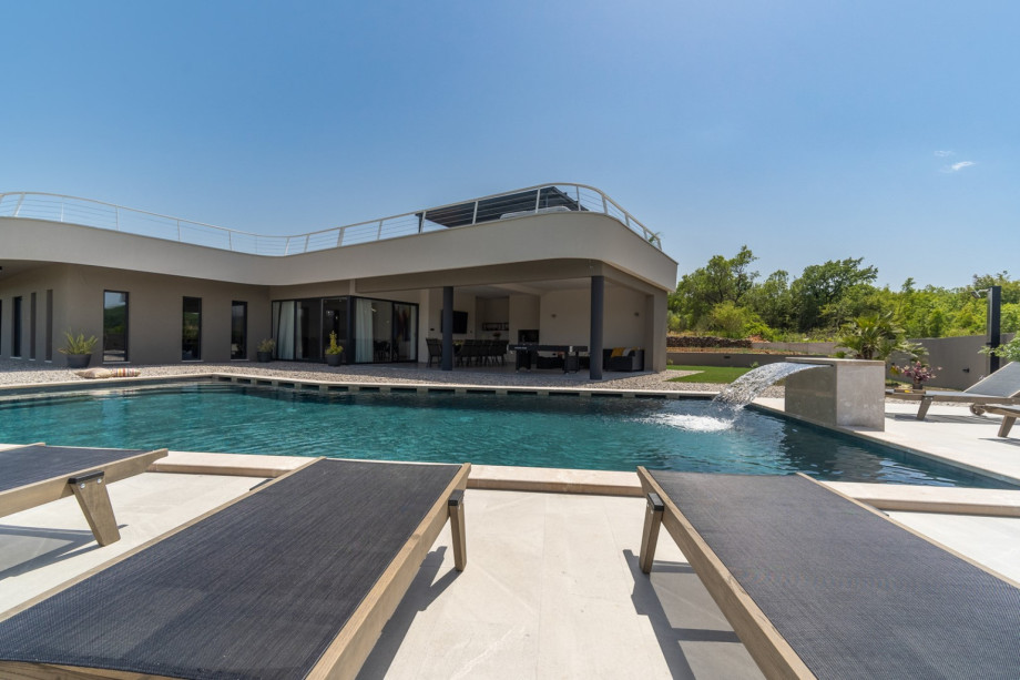 Sun deck offer 12 deck chairs, an outdoor shower, and the views from the pool area are spectacular