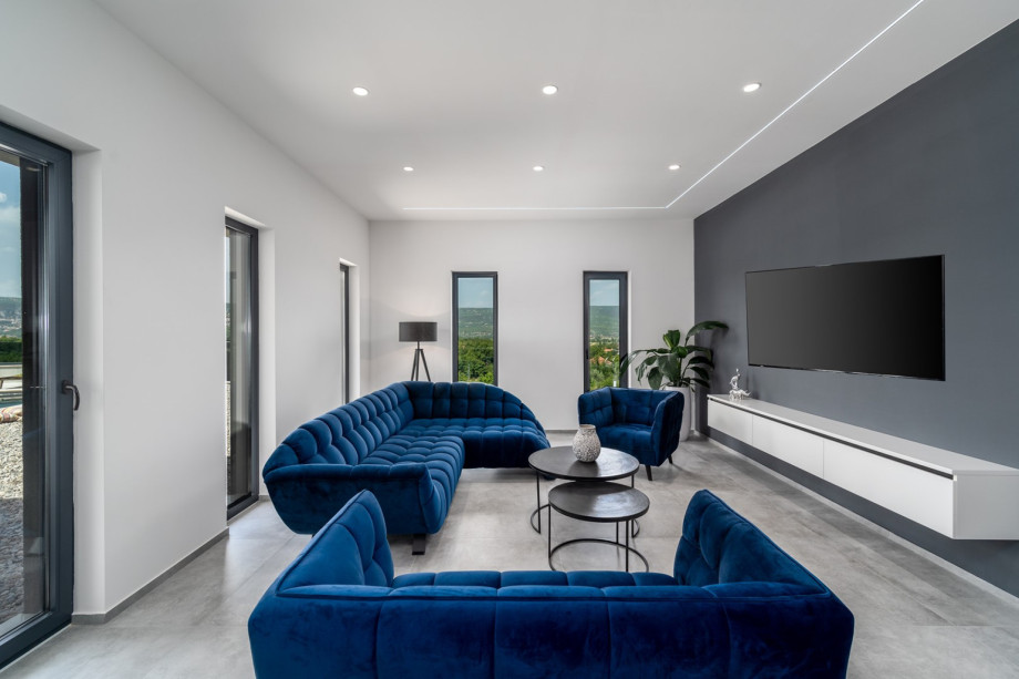 Comfortable living room with a smart TV, comfortable sofas, air-condition