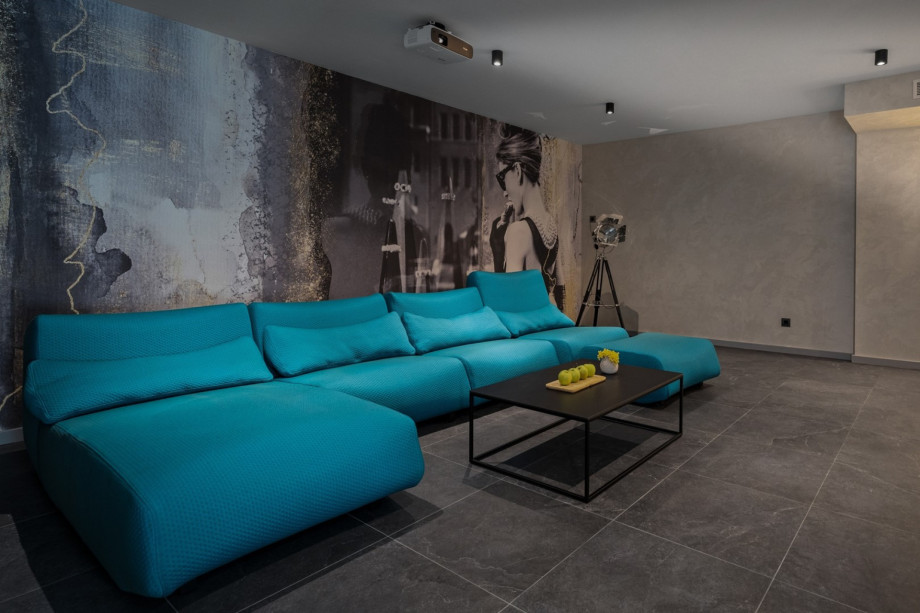 The Cinema room (32sqm) offers stylish and comfortable sofa, a Projector, air-condition, free WiFi