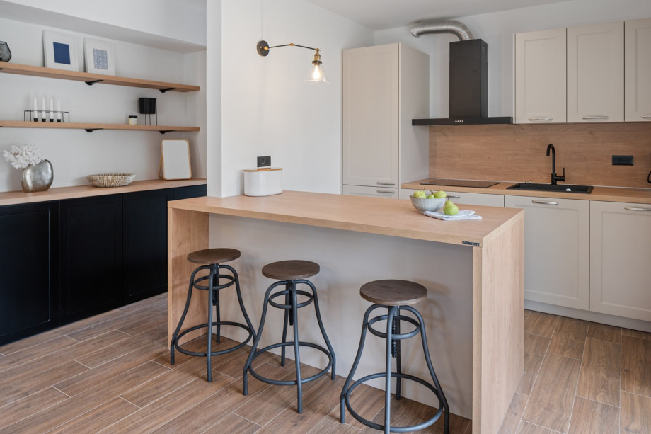 The kitchen island has all the amenities a modern guest needs