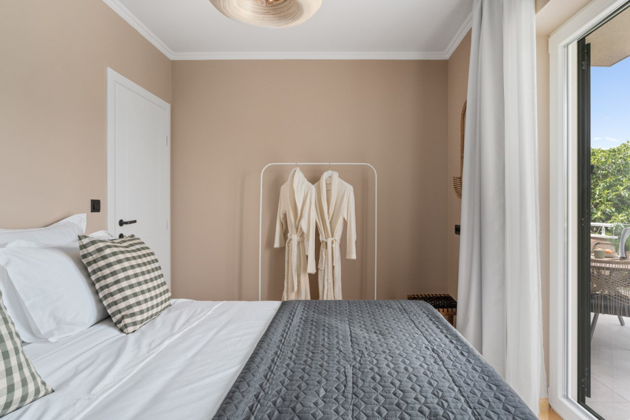The third bedroom features a 180cm by 200cm king-size bed