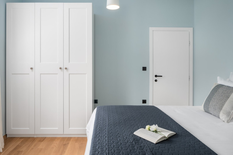 The first bedroom has an attached bathroom with a queen-size bed that measures 160 by 200 cm