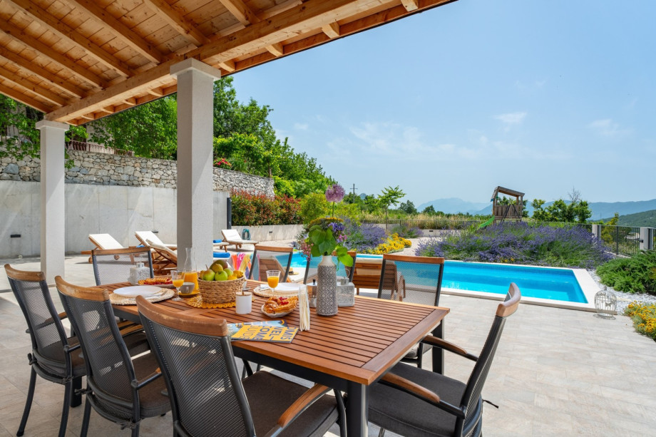 Covered dining corner, near the kitchen.