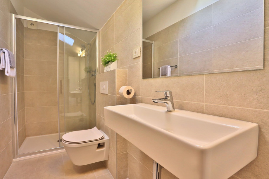 A family bathroom with a shower