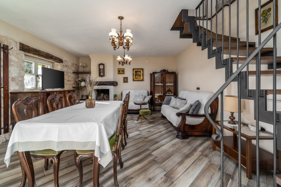 An indoor spiral staircase takes you to the first floor with Bedrooms