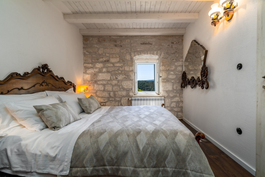 Bedroom No3 has a window with views of the valley and the river