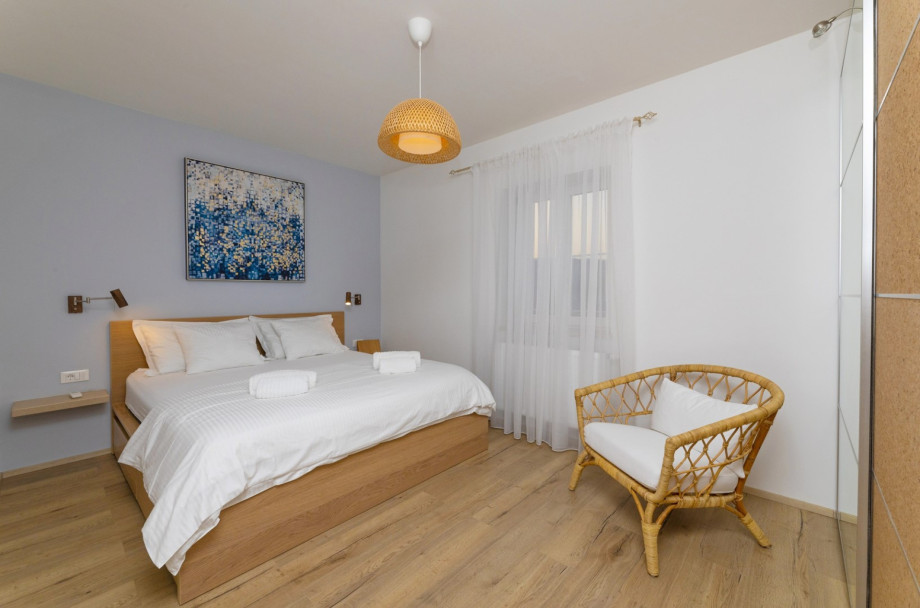 Bedroom No1 (13,2qsm) with king size bed 180cm x 200cm, air-condition, and views of the Dol valley and the sea.