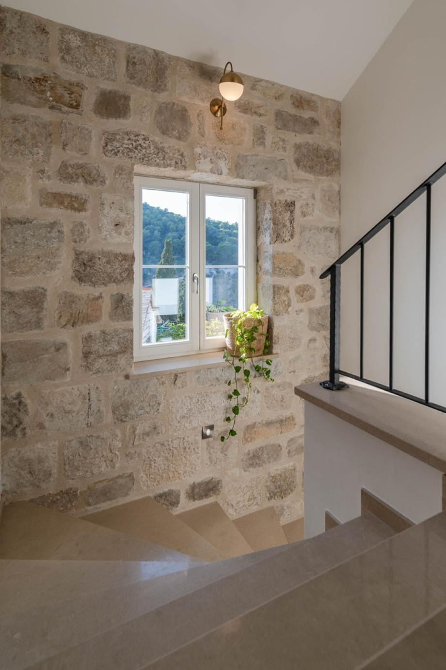 There is an indoor staircase to the garage where you also have Table tennis.