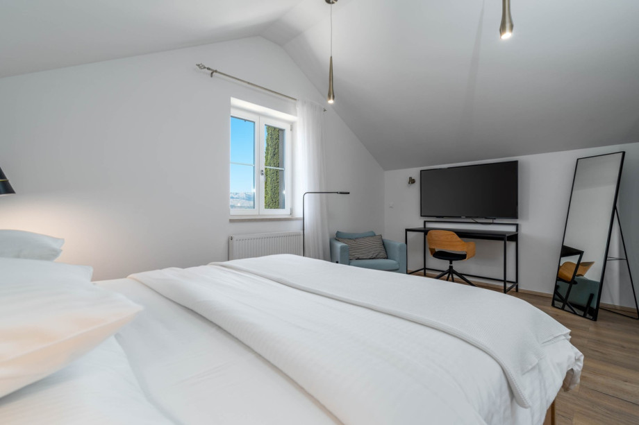 Bedroom No2 with king-size bed 180cm x 200cm, A/C, a TV.