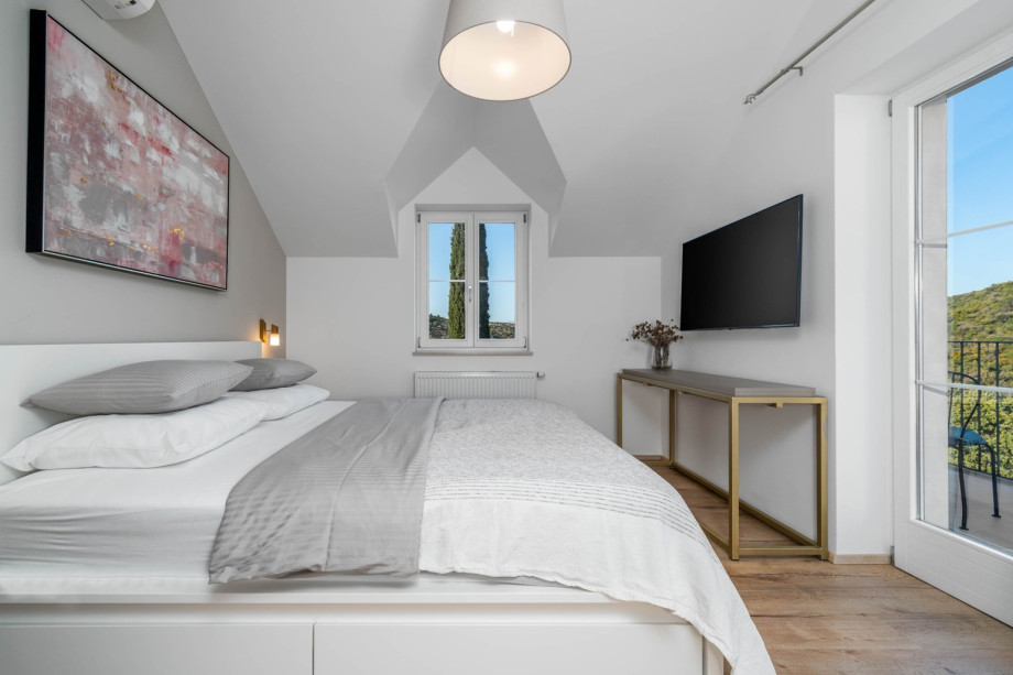 Bedroom has a view of the Dol valley and the sea.