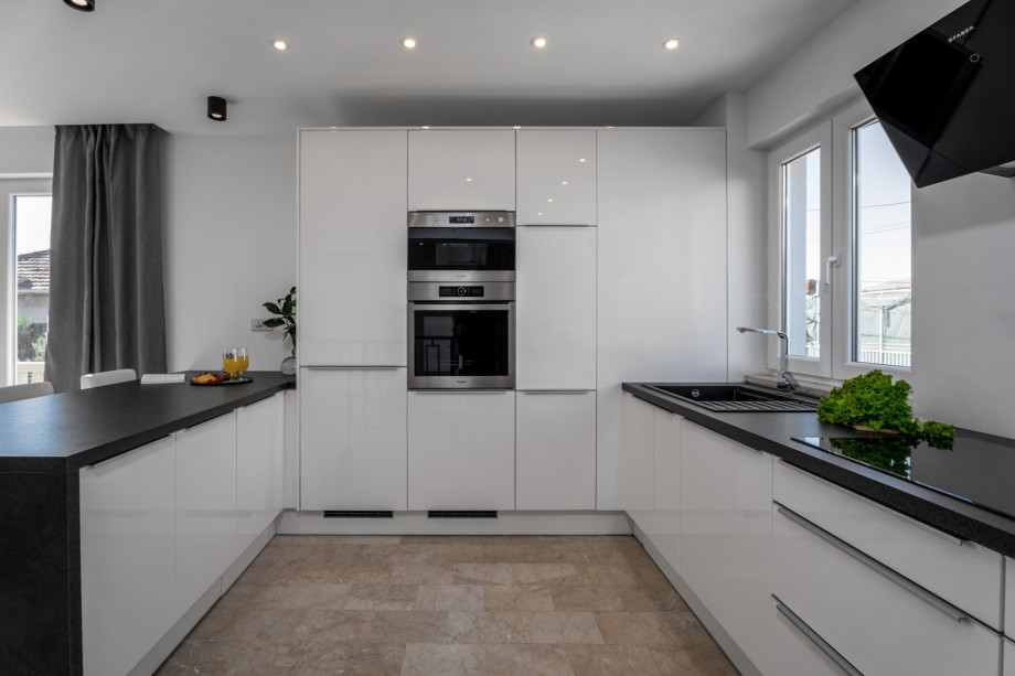 There is a fully equipped and very modern kitchen with all the amenities you need.