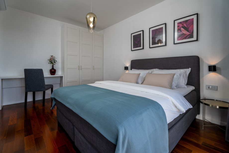 Bedroom No2, with air-conditioning, and a TV.