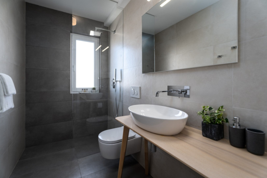 Family bathroom with a shower.