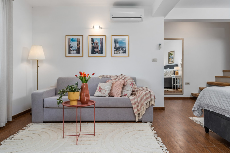 The bedroom area  offers a king-size bed 180cm x 200cm, a sofa that can convert into a sofa bed 160cmx200cm